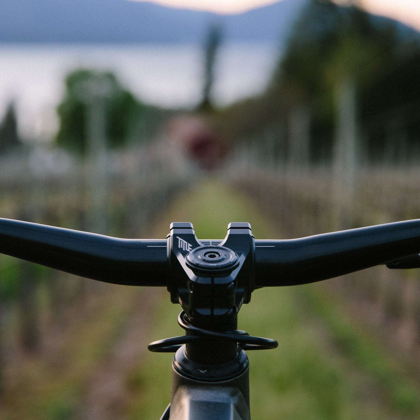 ST1 31.8 - Title MTB 31mm mountain bike stem shown on mountain bike from riders perspective