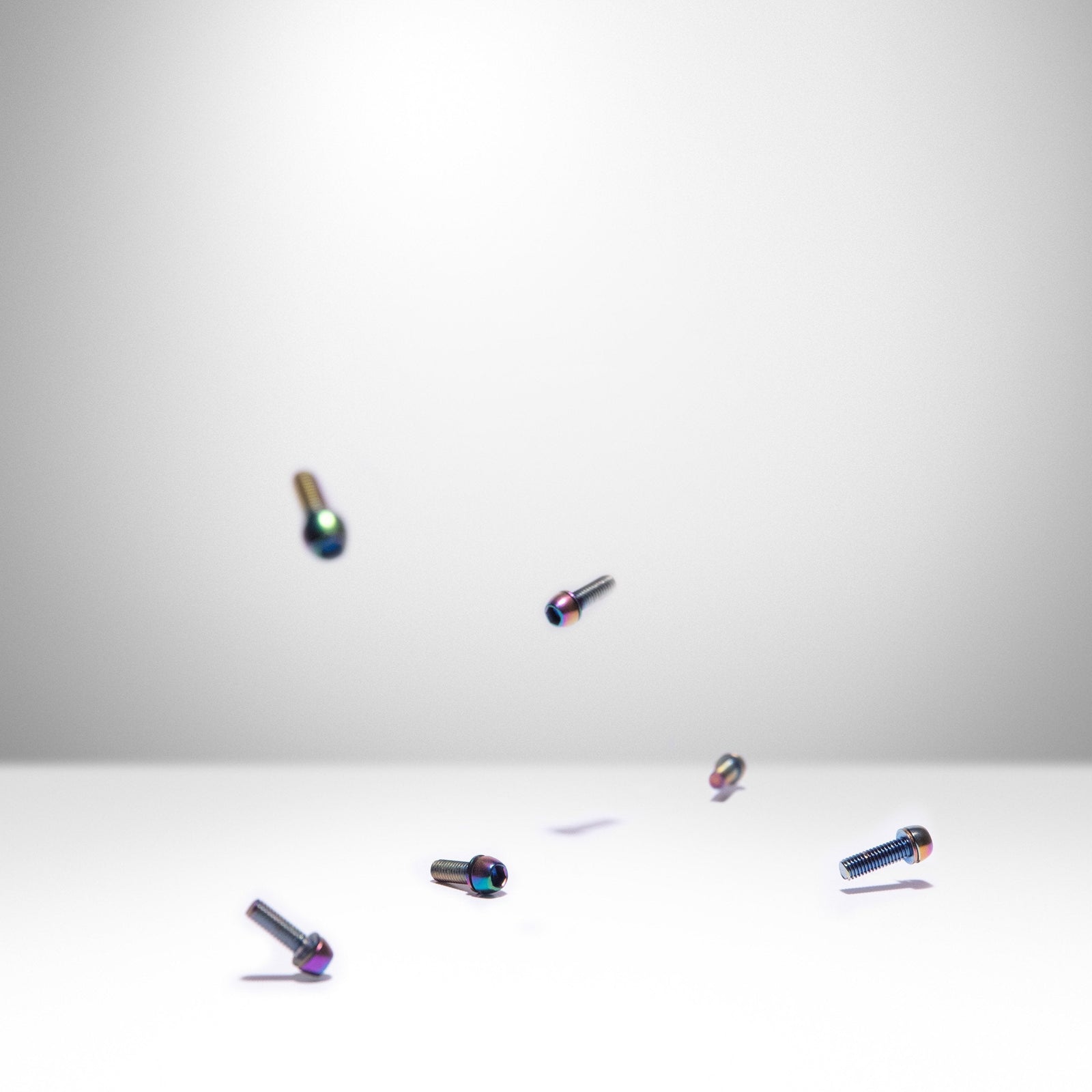 ST1 35 - Title MTB oil slick rainbow coloured bolts